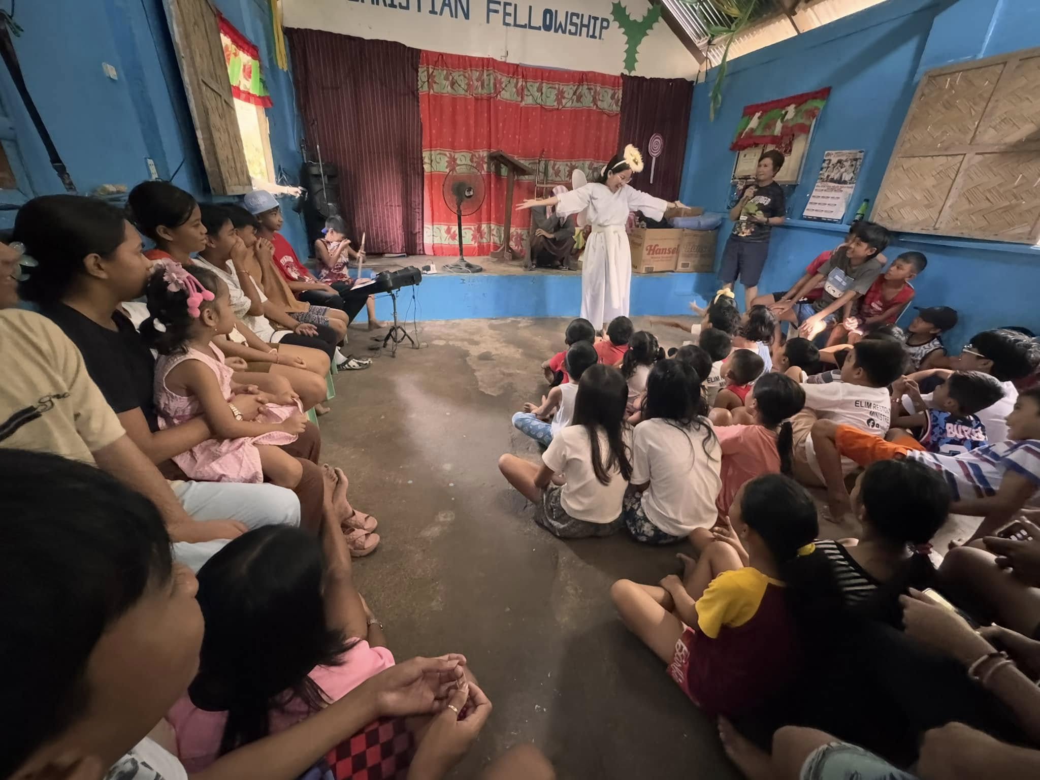 A performer retelling the Christmas story to children