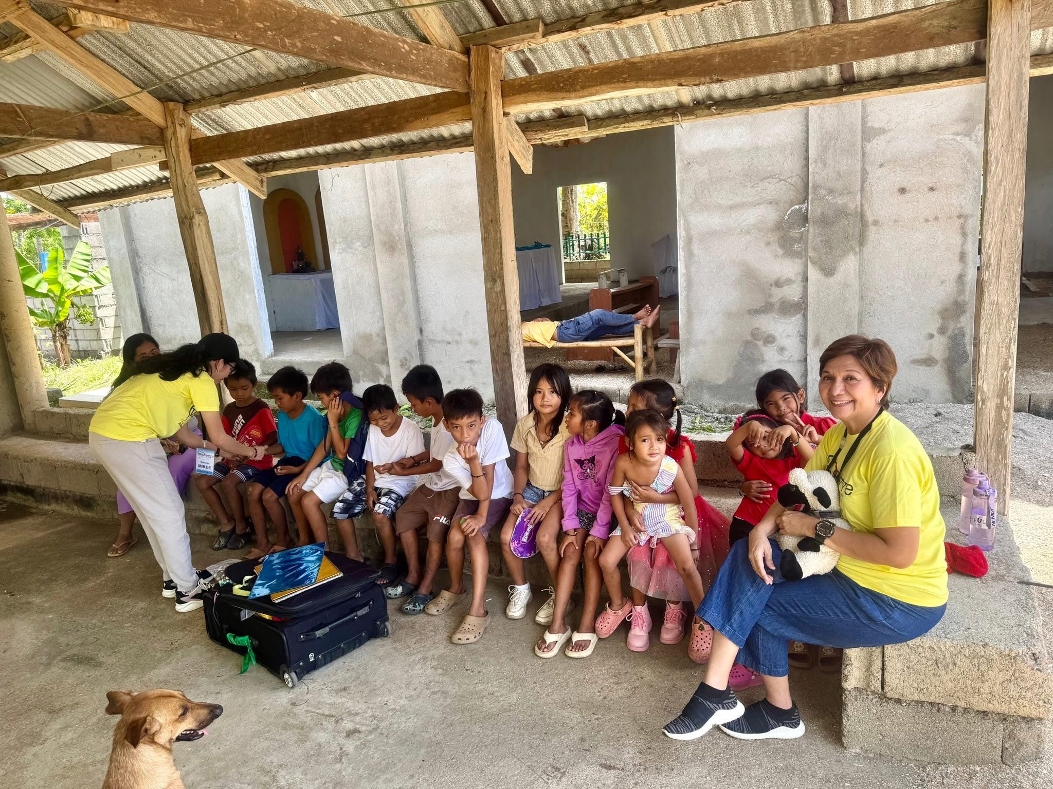 Children gathered with New Hope to Asia teachers during a Superkids Bible Club in Masbate Province